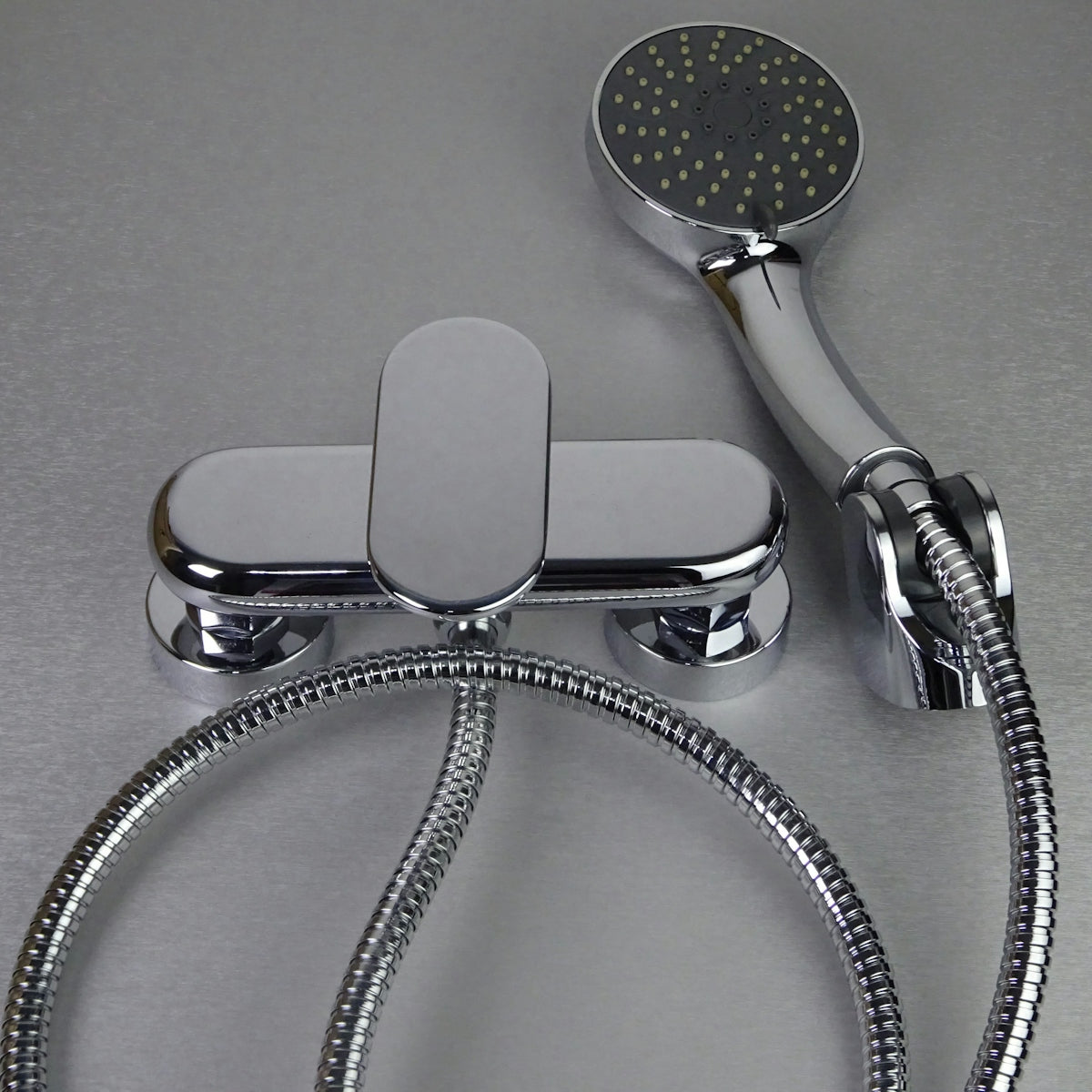Chrome bathtub faucet with handheld showerhead