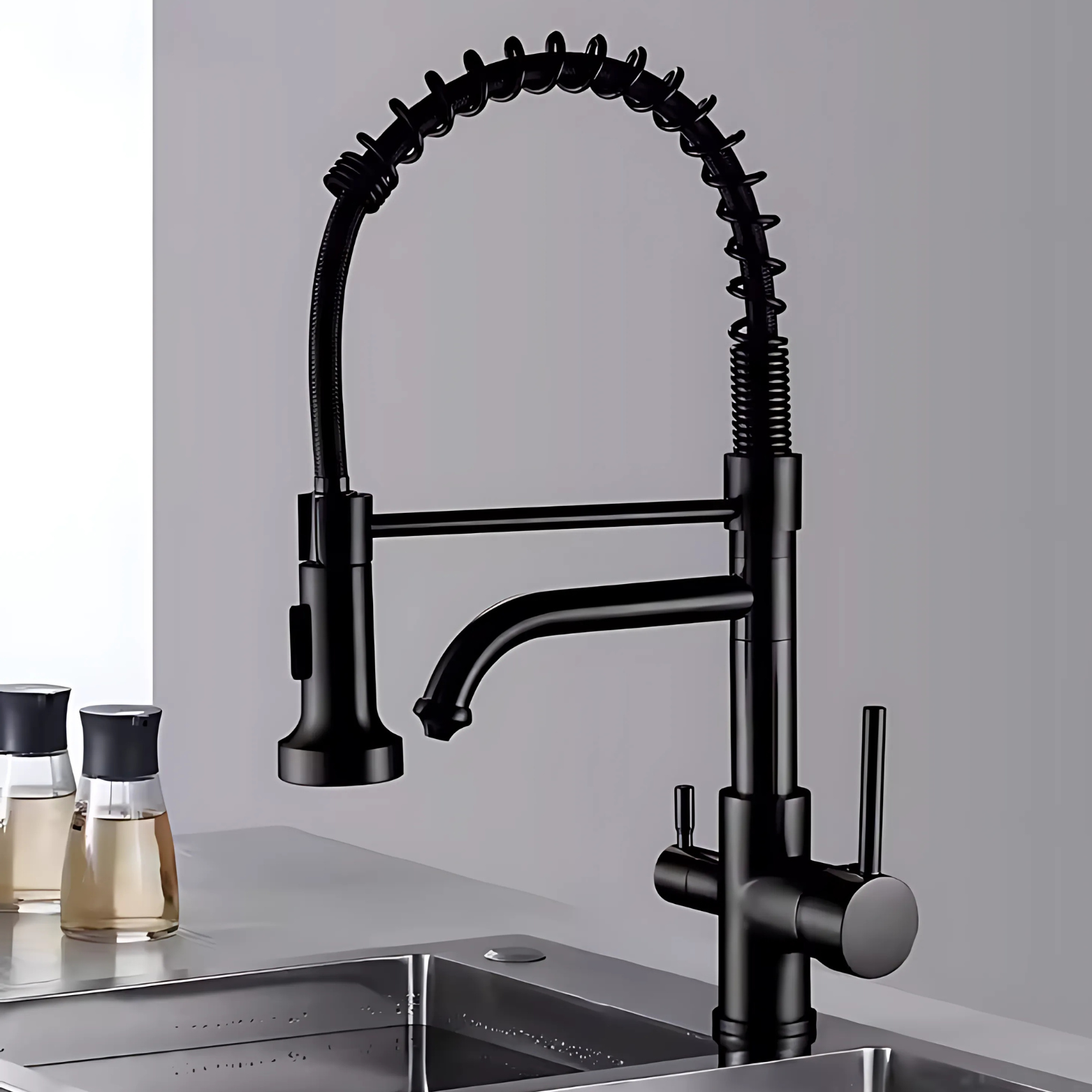 Black kitchen faucet with a spring design on a gray background