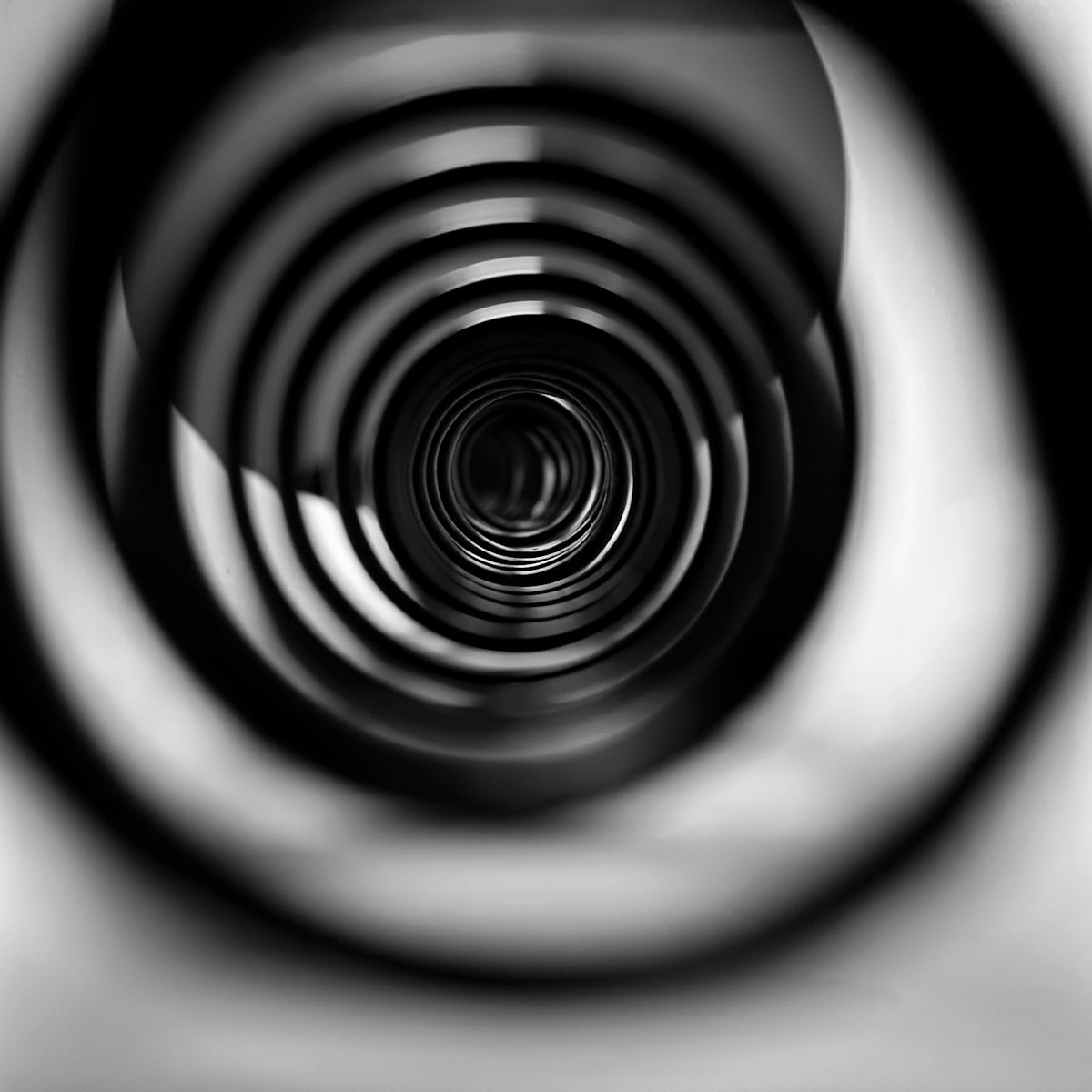 a black and white photo of a circular object